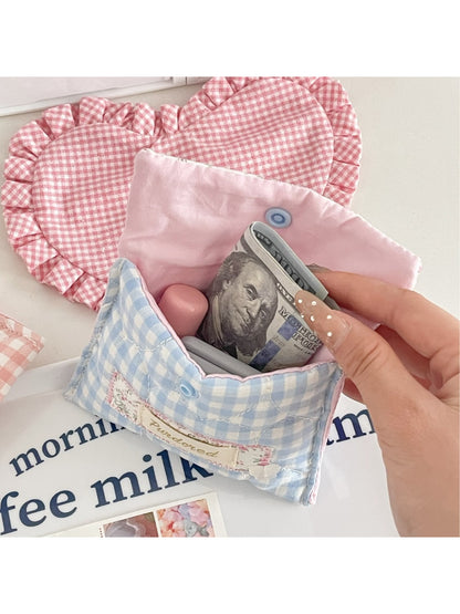 Close-up of snap button closure on Cosbai Floral Gingham Pouch