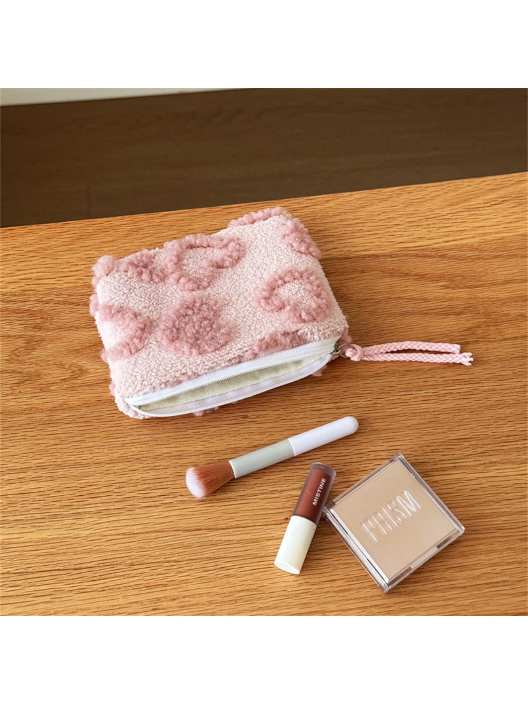 Cosbai plush heart pouch opened to reveal interior storage space