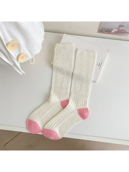 Side view of Rufia cozy crew sock highlighting soft sole look and contrast toe