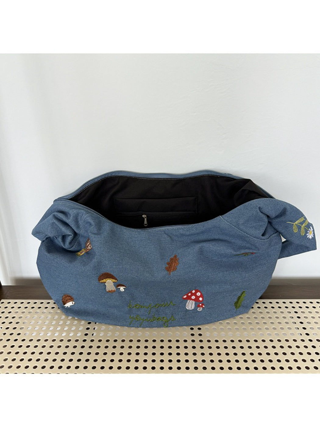 Cosbai Mushroom Stitch Shoulder Bag worn over shoulder by model