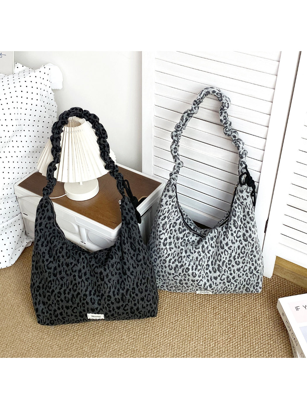 Close-up of Cosbai leopard slouchy shoulder bag showing textured fabric and stitching