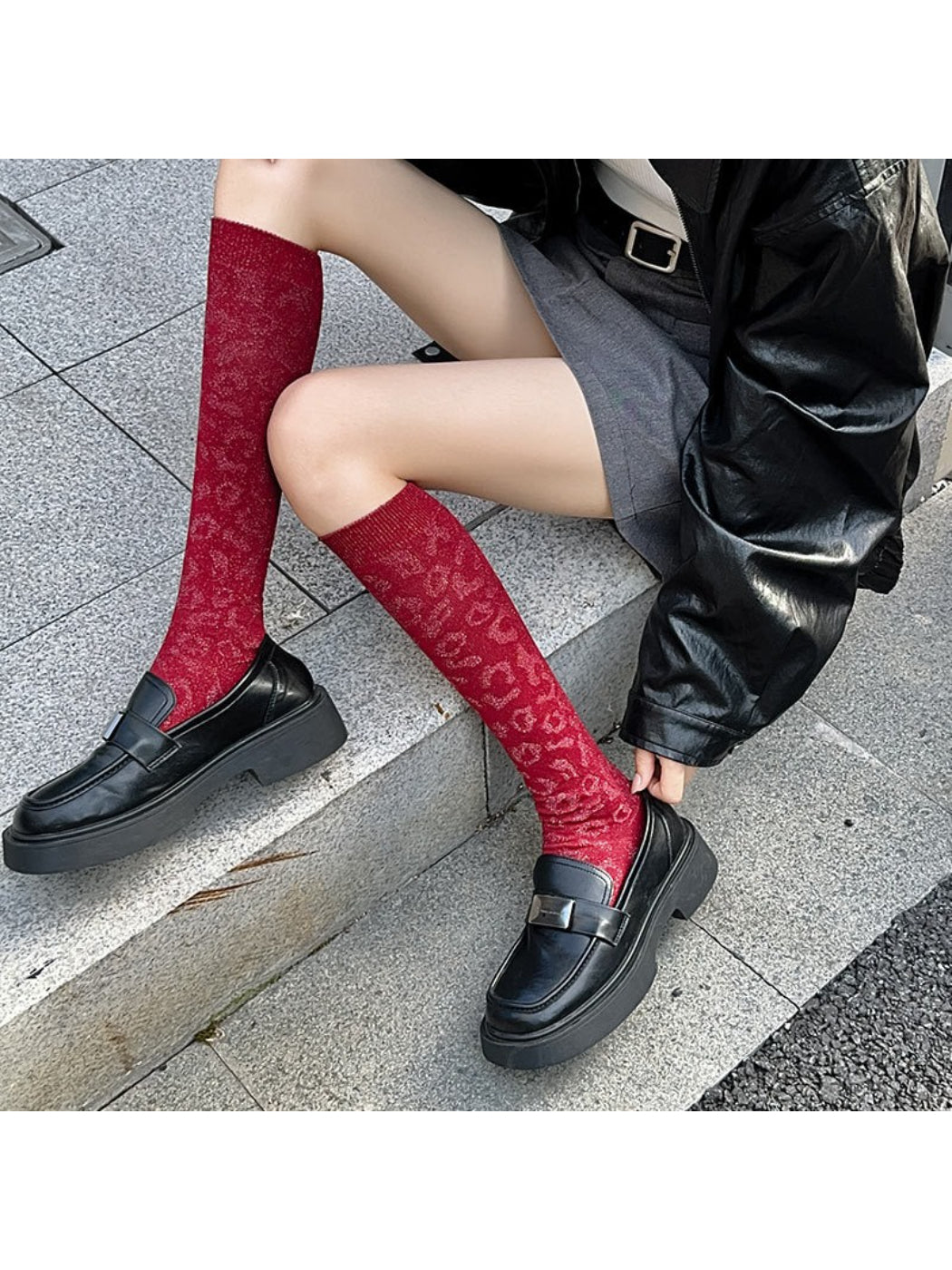 Close-up of Rufia knee high socks showing detailed leopard print pattern
