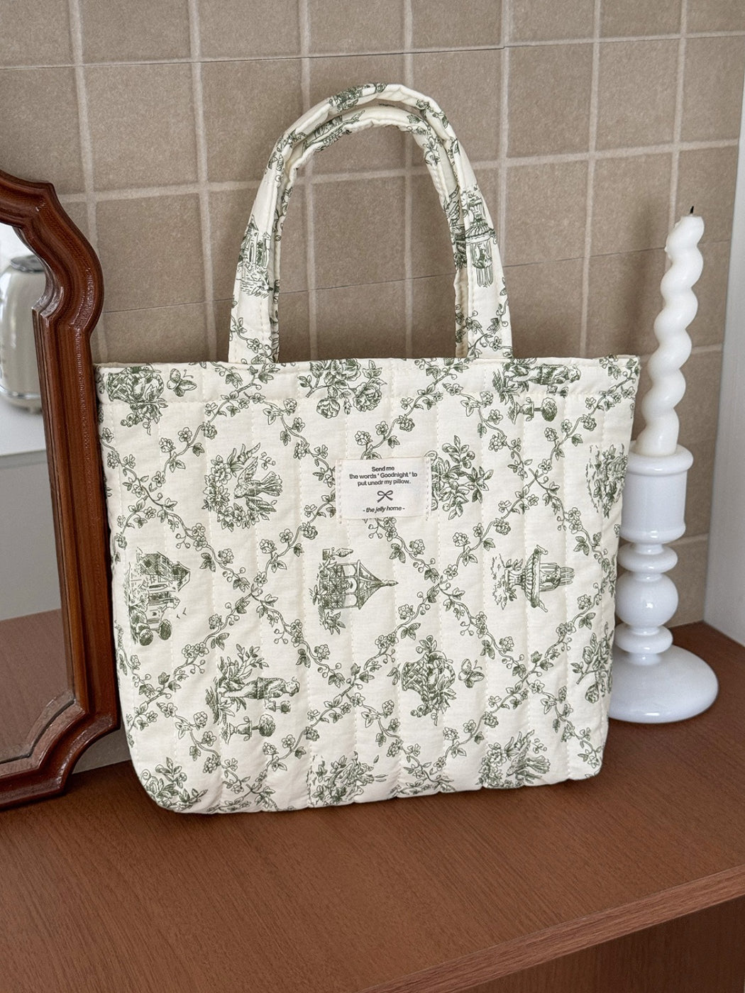 Cosbai pastel garden pattern tote bag hanging on a hook