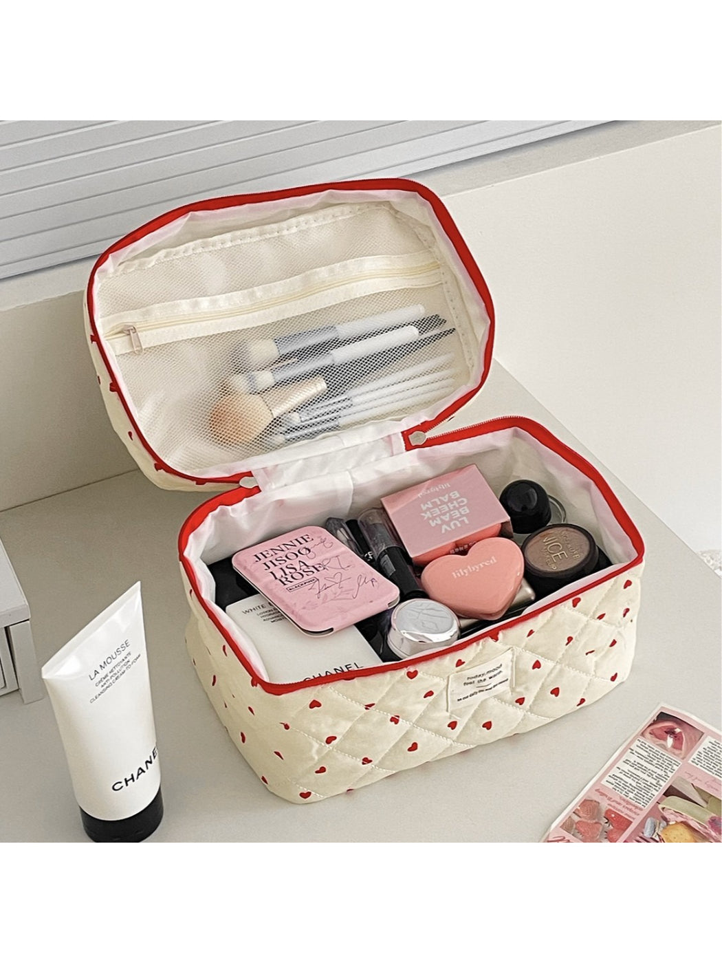 Open view of Cosbai cosmetic organizer bag showing multiple and
