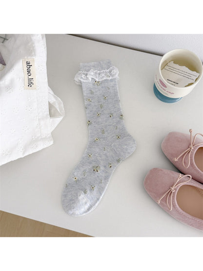Close-up of fabric texture and lace cuff on Rufia Romantic Lace Cuff Crew Socks