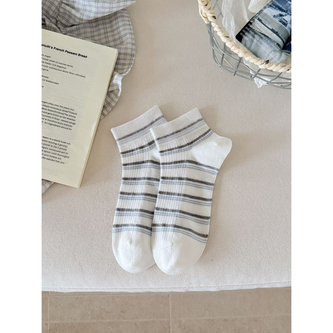 Model wearing Rufia Sweet Ribbon Accent ankle socks with casual shoes