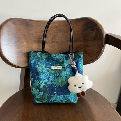 Close-up of Cosbai Mixed Print Everyday Carryall Handbag fabric texture and mixed print design