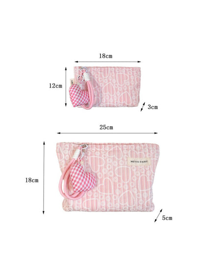 Cosbai heart print pouch partially open showing interior lining