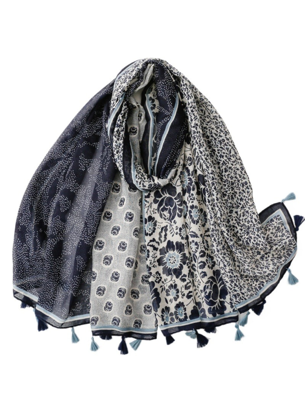 Boho patchwork wrap scarf in earthy tones displayed flat on a white background