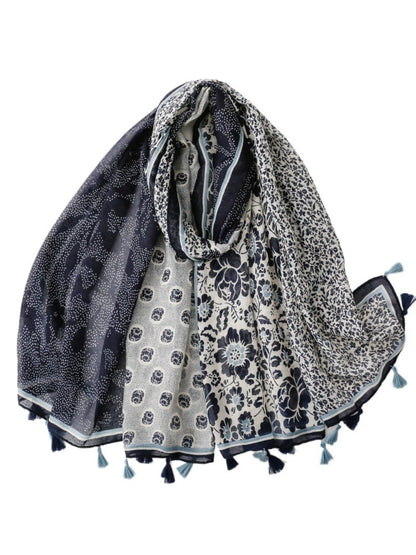 Boho patchwork wrap scarf in earthy tones displayed flat on a white background