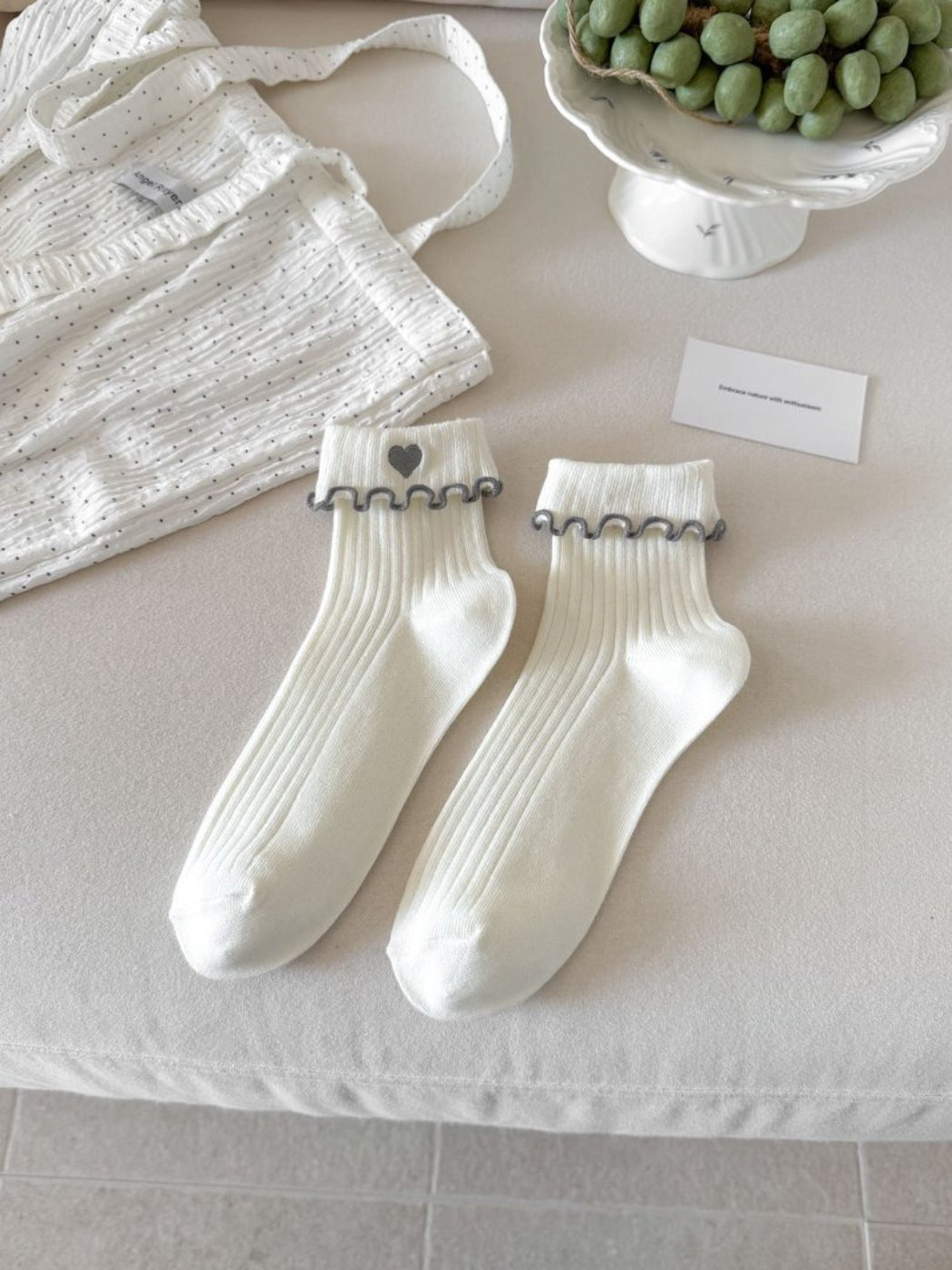 Rufia Sweet Heart Edge Ribbed Socks paired with casual shoes showing scalloped heart detail