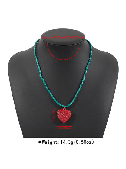 Color Charm beaded necklace with beads in pastel and bright shades on white surface