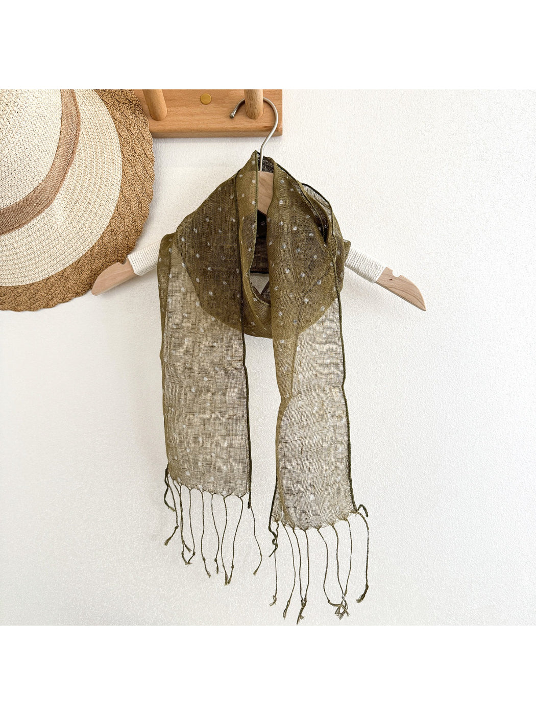 Scarvii long skinny scarf folded neatly showing polka dot design