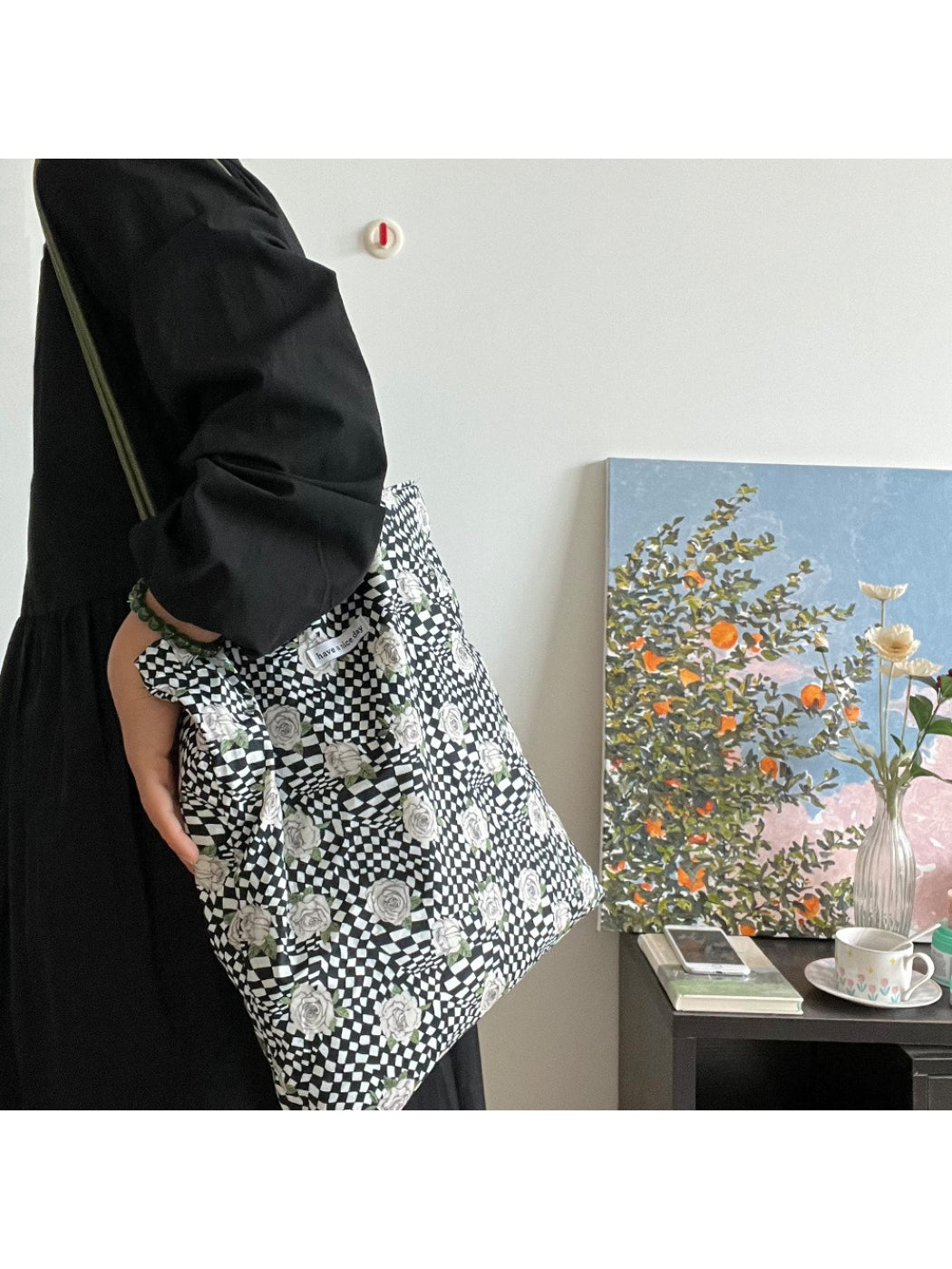 Close-up of Cosbai Checker Rose Drawstring Bag fabric texture and pattern details