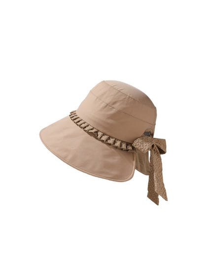 Beige Haila tie back summer hat with wide brim on a white background