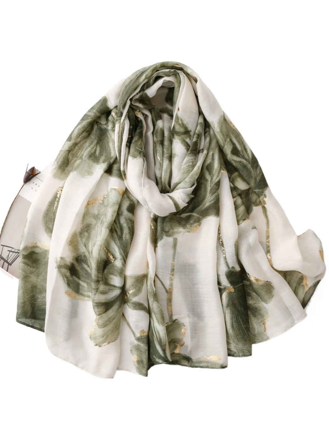 Scarvii scarf folded neatly with visible floral watercolor artwork