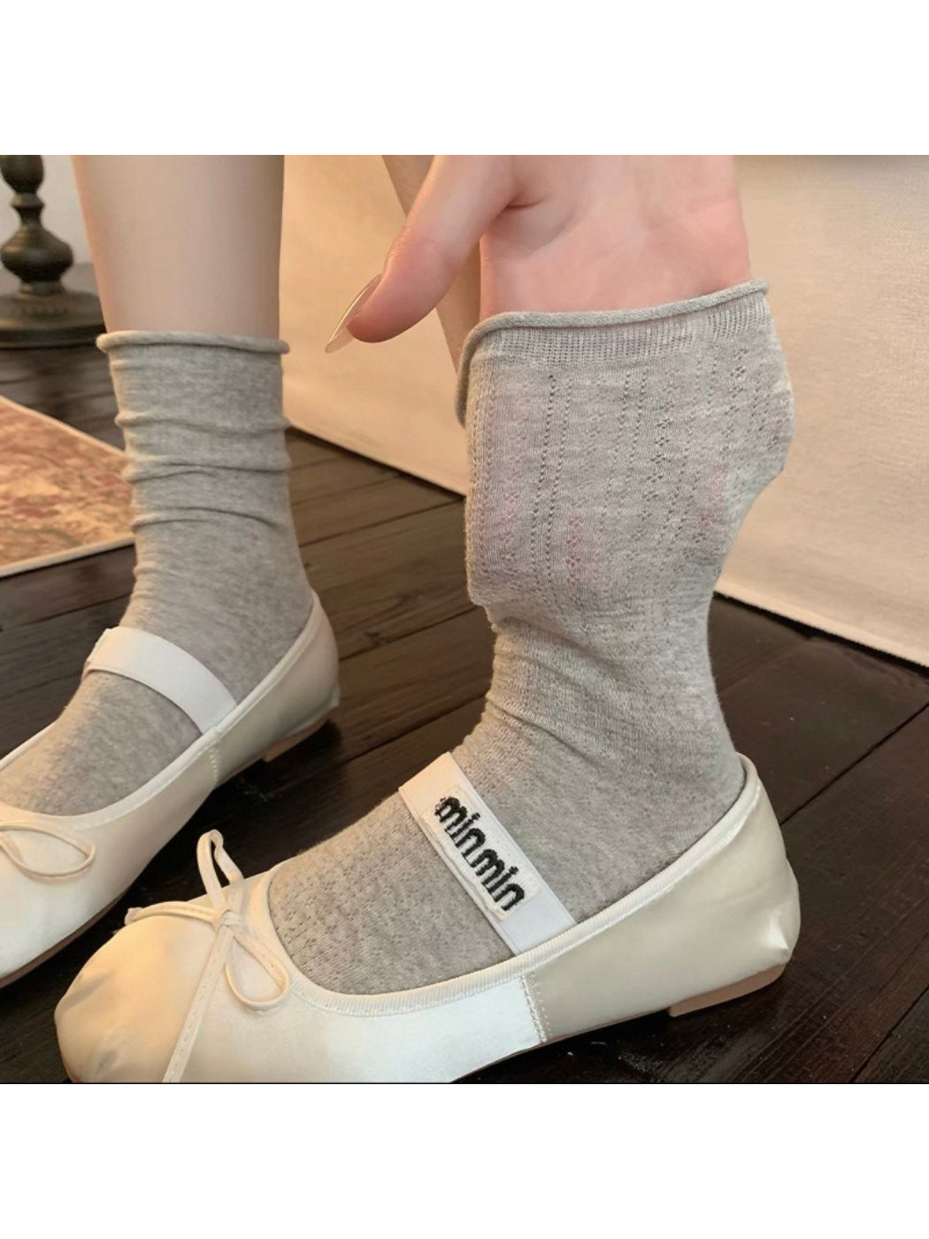 Rufia ribbed mid-calf socks stretched to show elasticity