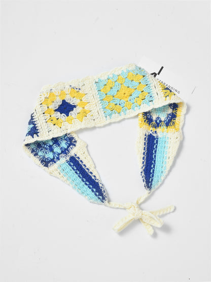 Side view of Haila crochet summer headband emphasizing its shape