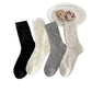 Rufia neutral textured crew socks displayed side by side on white background