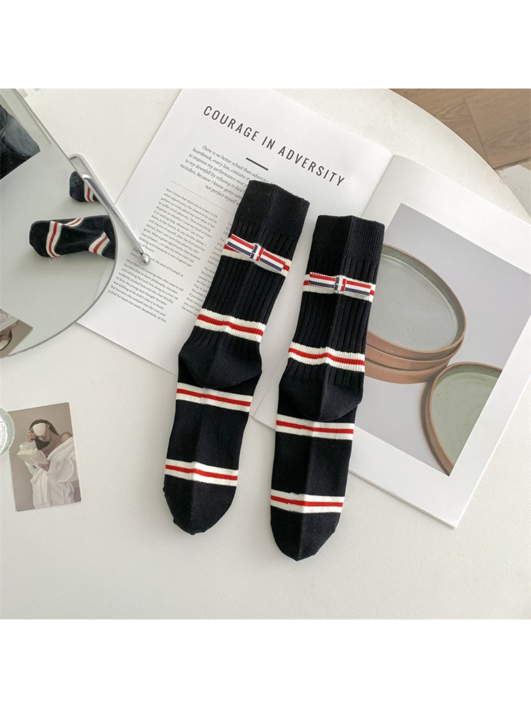 Close-up of Rufia crew socks showing ribbed texture and vibrant stripe pattern