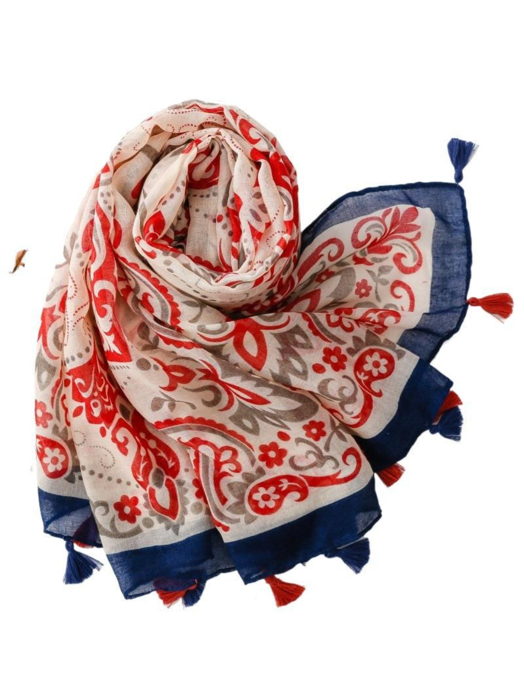 Scarvii boho scarf draped over a chair highlighting the red border and pattern