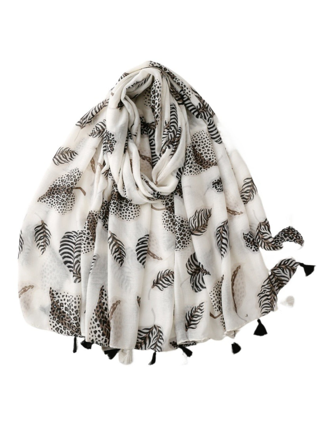 Model wearing Scarvii Jungle Leaf Fringe Scarf styled around the neck with fringed ends visible