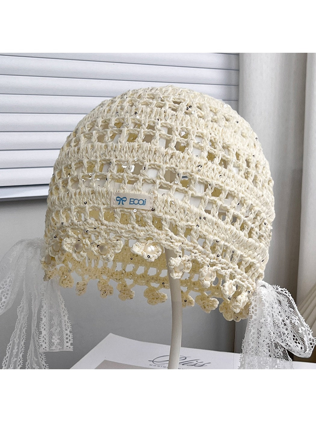 Haila - Bow Detail Hollow Knit Round Hat