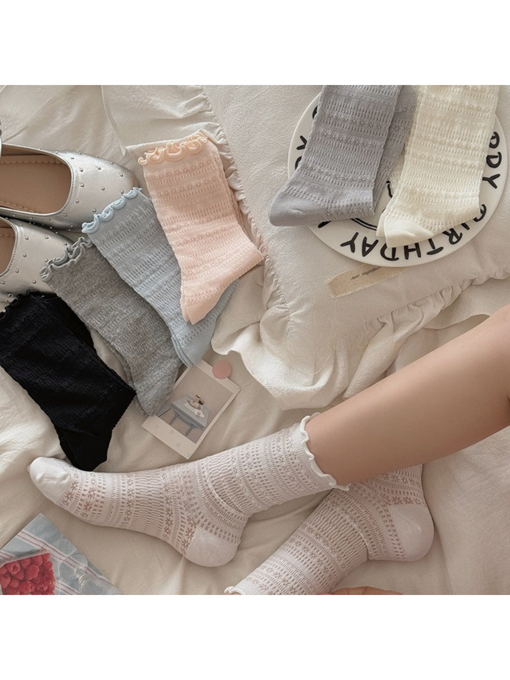 Close-up of Rufia Sweet Ruffle Edge Socks showing delicate ruffle trim detail