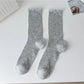 Model wearing Rufia soft ribbed ruffle crew socks with casual shoes