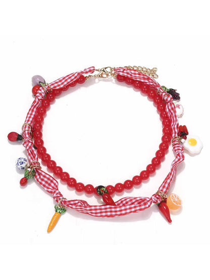 Neckit beaded scarf necklace arranged in a circular shape showing charm details