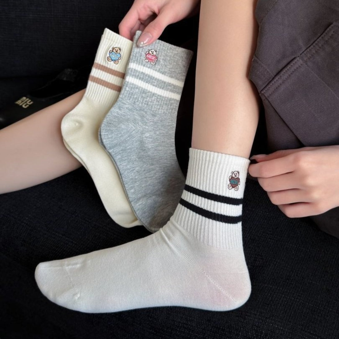 Pair of Rufia Mini Motif Stripe Crew Socks laid flat displaying full design