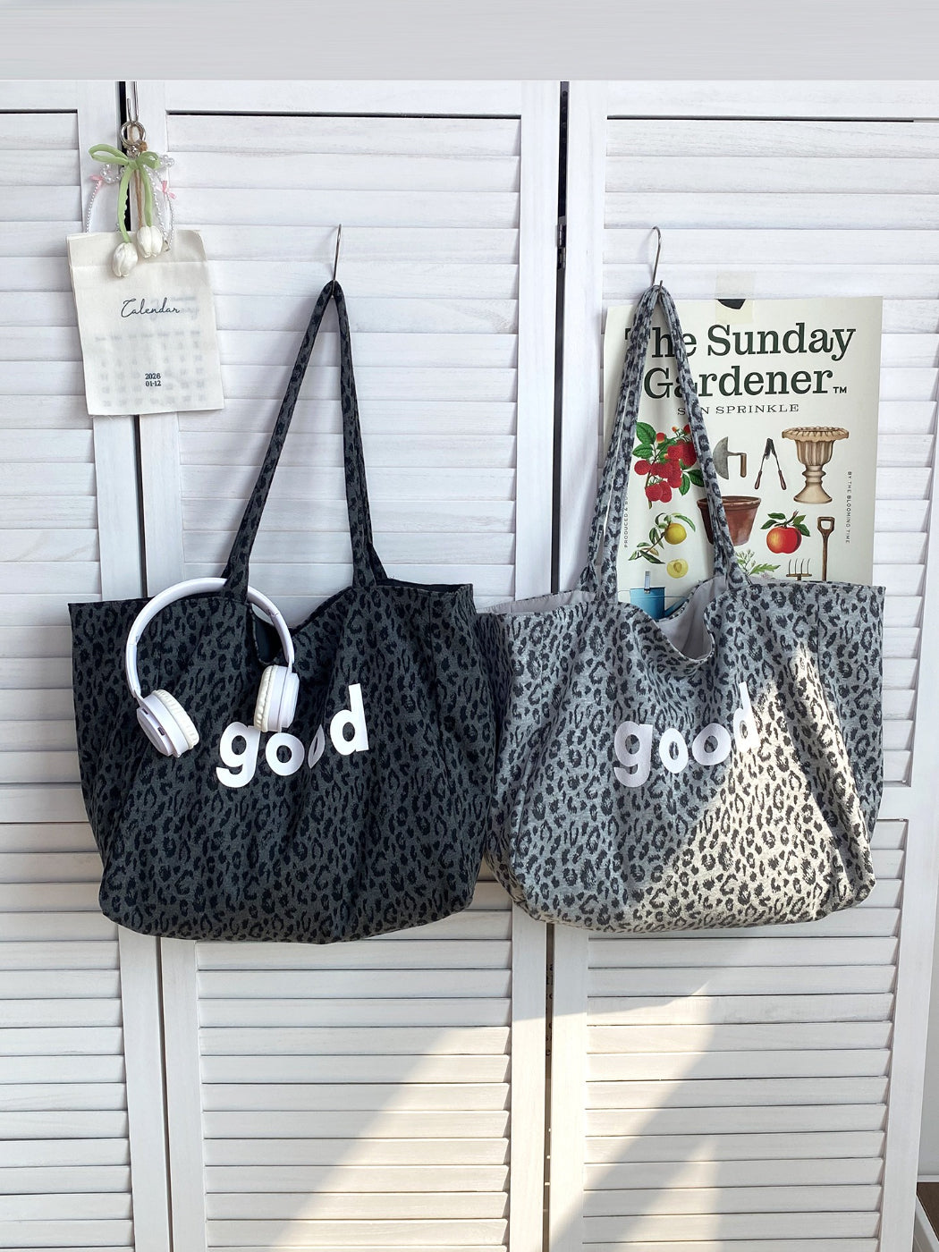Side view of Cosbai leopard graphic tote bag showing depth and handle