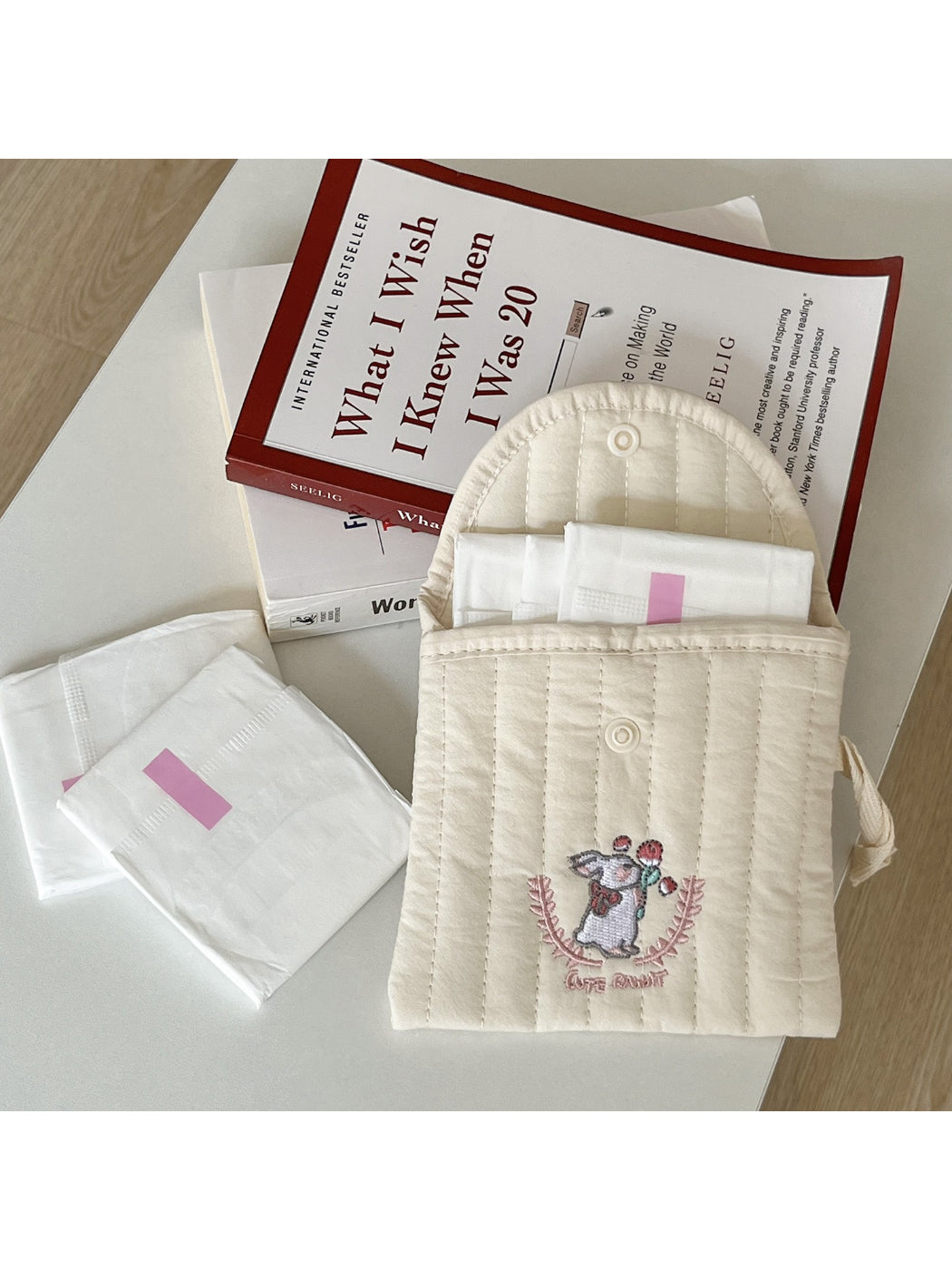 Close-up of the button and stitching detail on Cosbai animal pouch