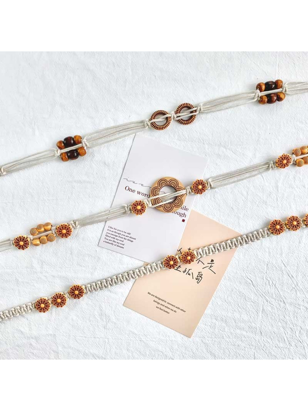 Beco floral rope tie waist belt tied in a bow on a white background