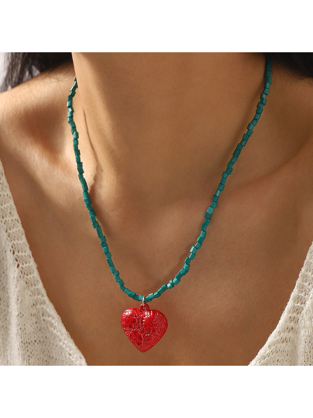 Side view of Color Charm beaded necklace showing bead arrangement and clasp