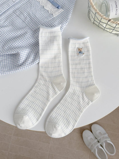Model wearing Rufia Sweet Bear ribbed crew socks with casual shoes