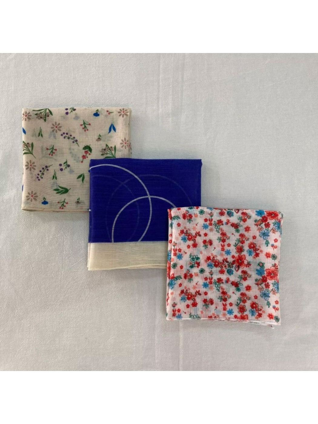 Soft square scarf with delicate garden floral print in pastel colors