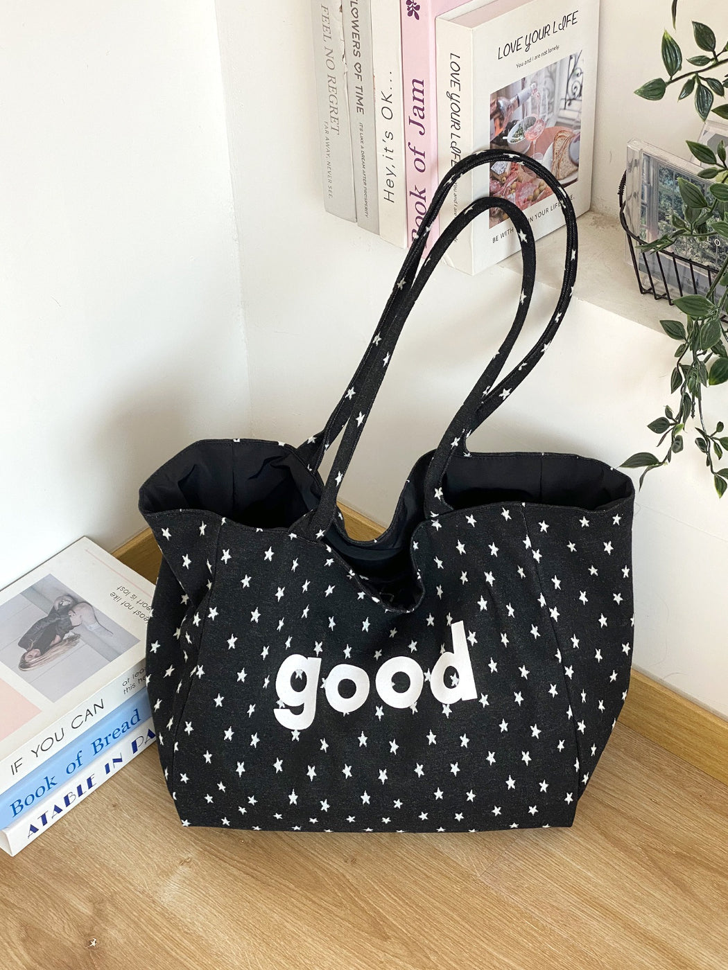 Cosbai tote bag filled with items, displaying spacious interior