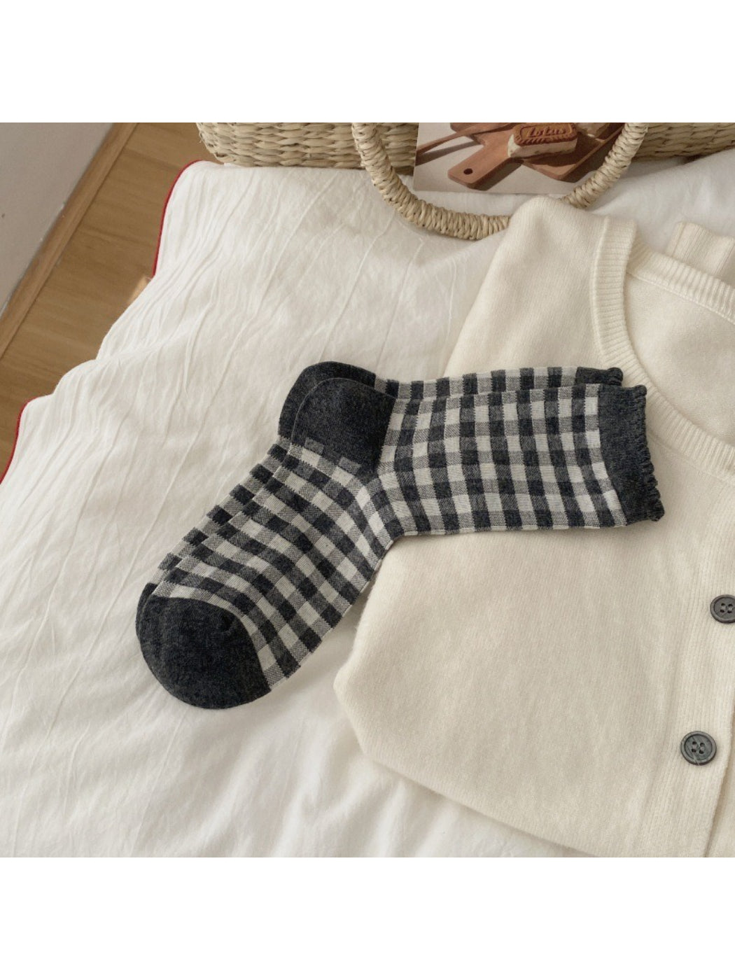 Pair of Rufia vintage check and flower crew socks laid flat showing pattern