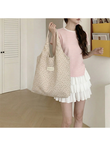 Cosbai Tiny Floral Slouch Tote Bag styled with casual outfit outdoors