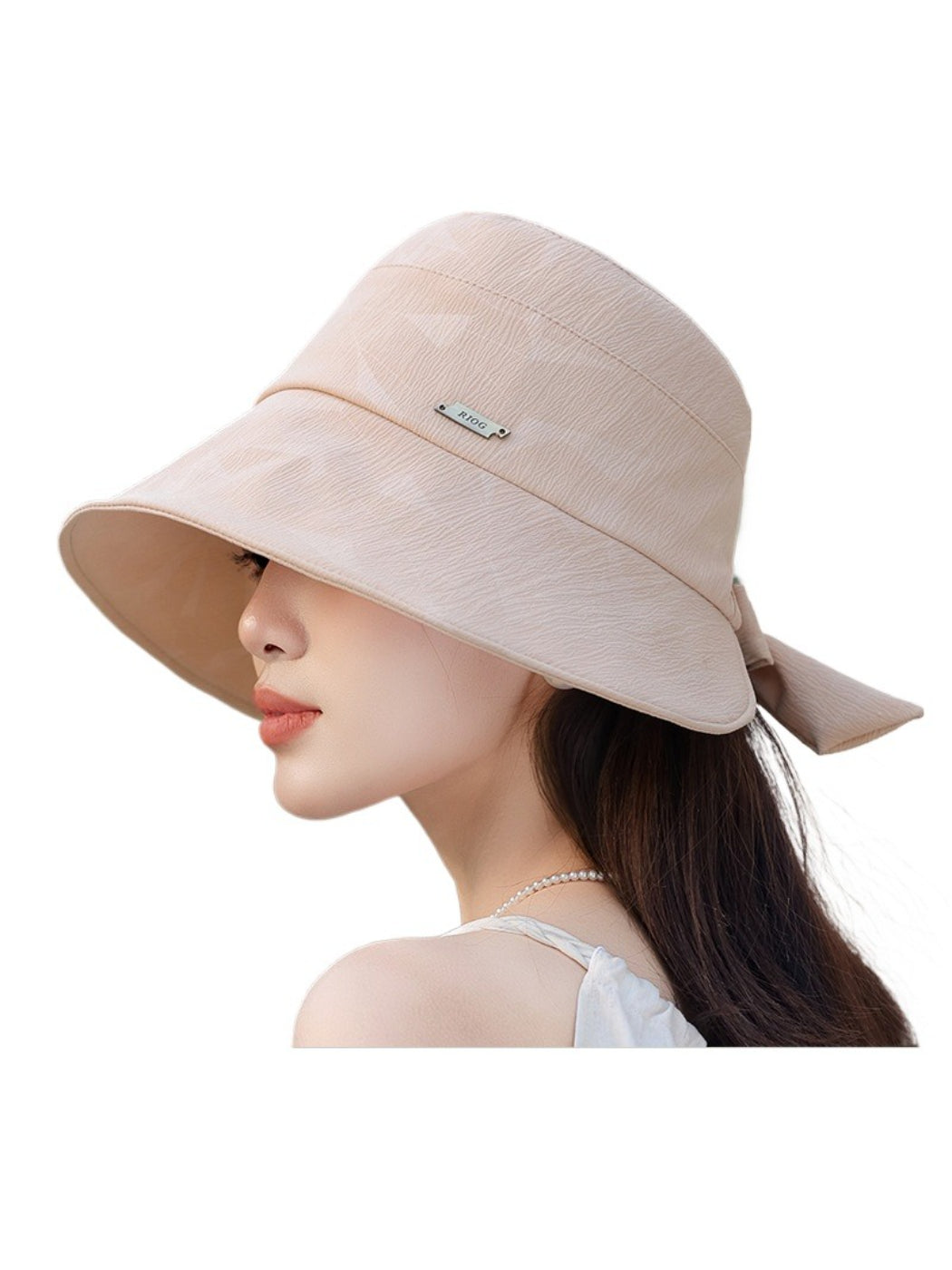 Haila textured bow bucket hat folded to show inner lining and structure