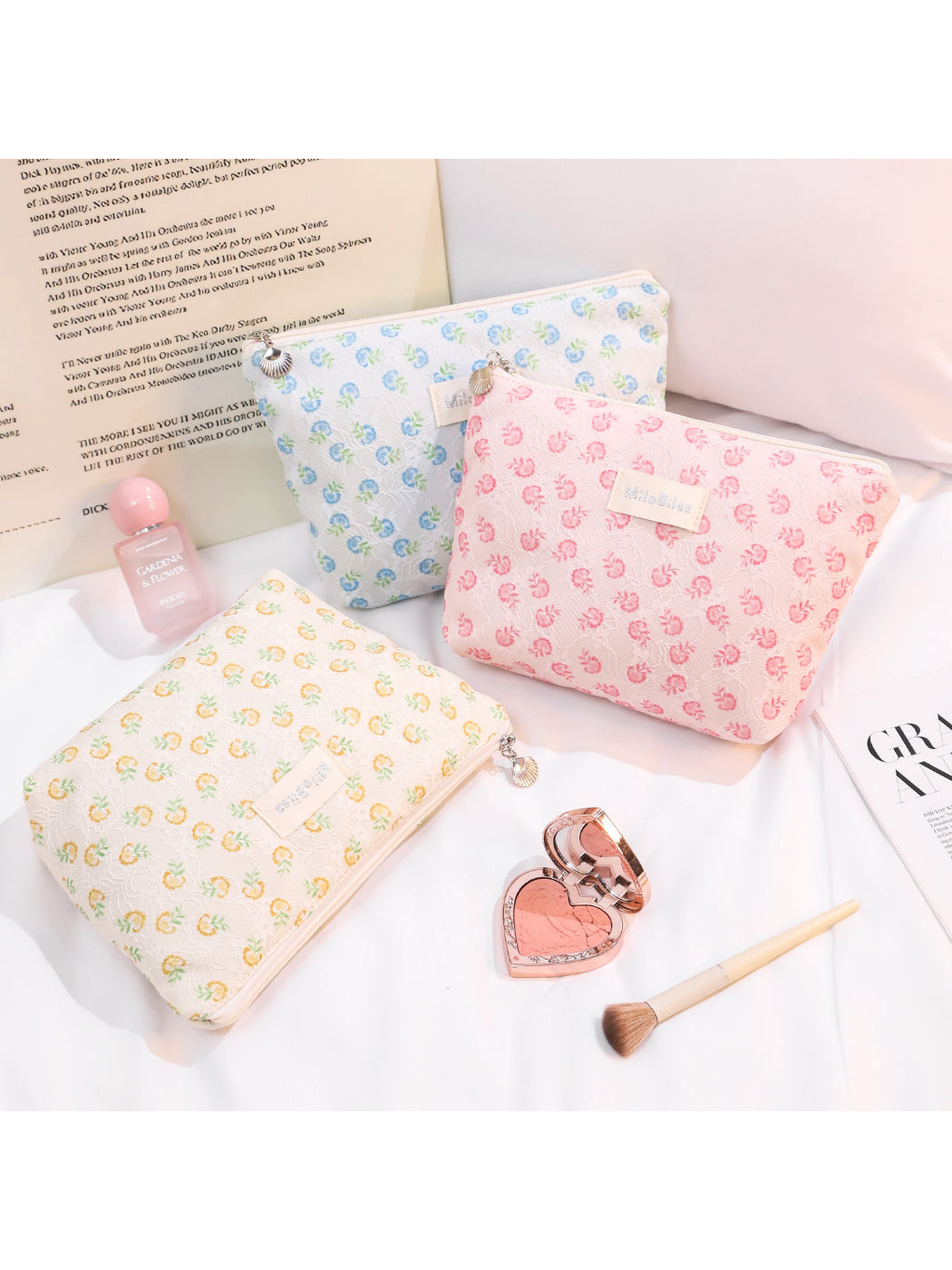 Cosbai small floral embroidered makeup cosmetic pouch with colorful flower designs on fabric
