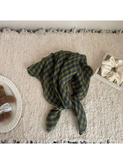 Soft check bandana scarf folded on a white background