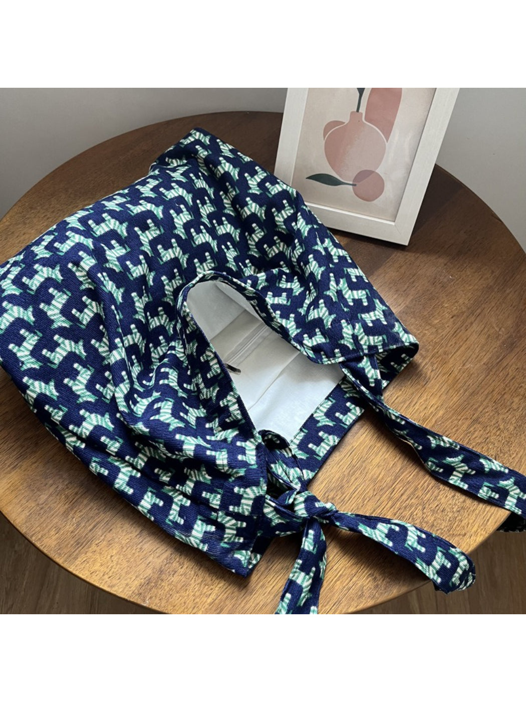 Side view of Cosbai blue zebra print shoulder bag showing strap detail