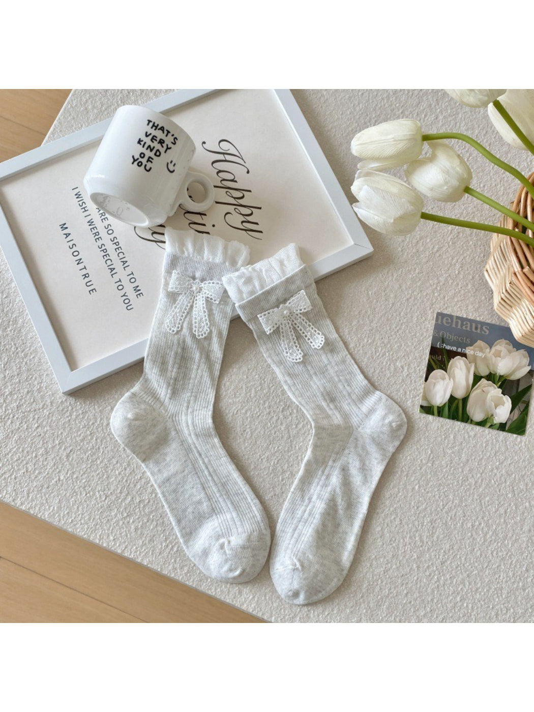 Pair of Rufia Sweet Ribbon Trim Crew Socks laid flat