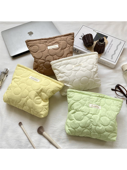 Cosbai Quilted Daisy Cosmetic Pouch in cream with yellow daisy pattern, front view