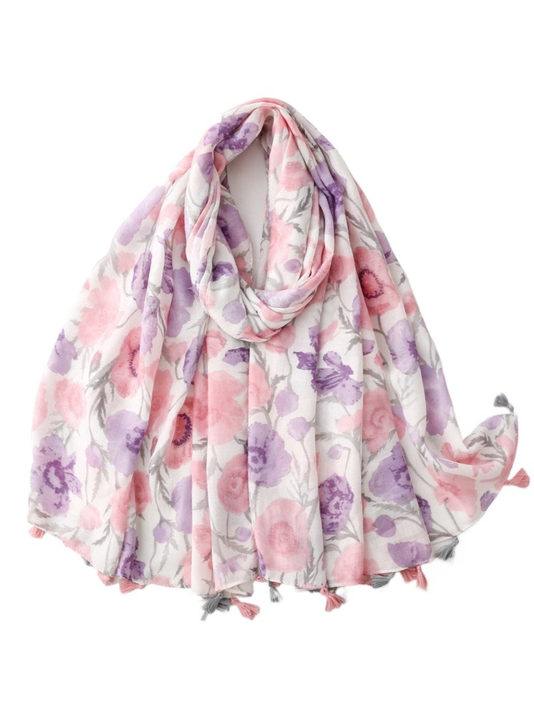 Scarvii scarf spread out flat displaying full watercolor bloom pattern and tassel fringe