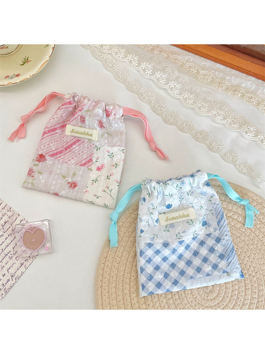 Cosbai floral patchwork drawstring pouch with colorful flower patterns on fabric