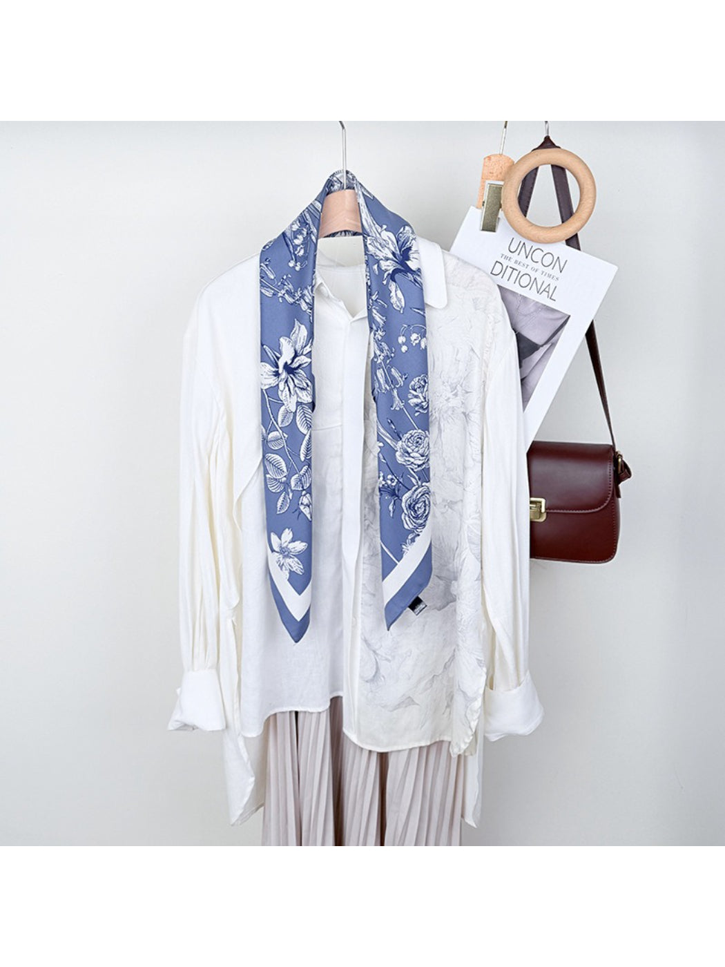 Scarvii square scarf with colorful floral print laid flat
