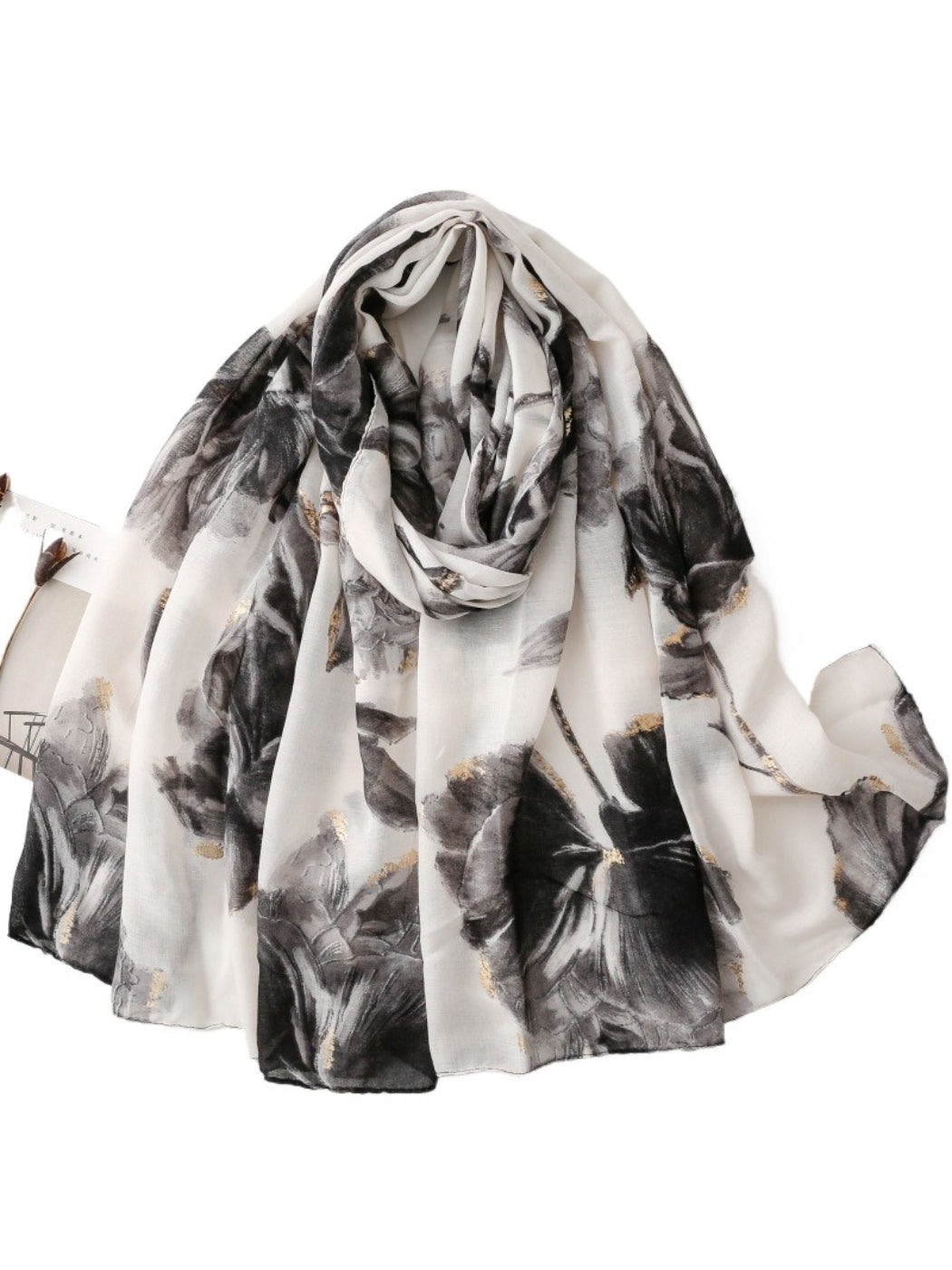 Scarvii scarf laid flat showing full floral print in pastel colors
